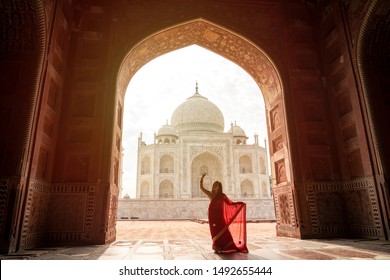 Indian Woman In Red Saree/sari In The Taj Mahal, Agra, Uttar Pradesh, India