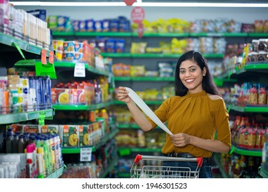 Indian Woman Shopping At Grocery Store