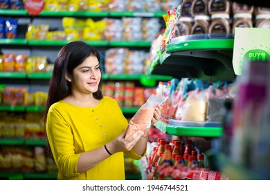 Indian Woman Shopping At Grocery Store