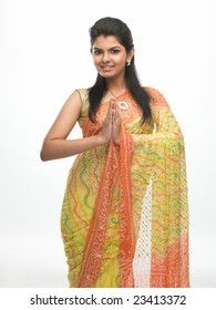 Indian Woman In A Tradition Sari With Welcome Expression