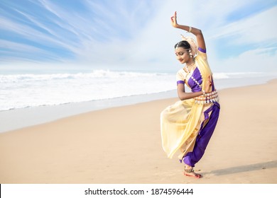 Indian woman traditional Dancers performing Odissi dance 