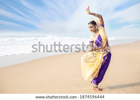 Indian woman traditional Dancers performing Odissi dance 