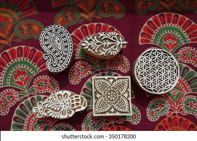 Indian wood printing blocks with block printed textile background