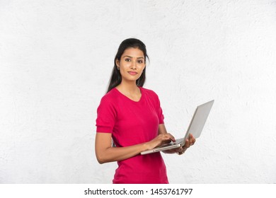 Indian Working Woman Using Laptop, White Background