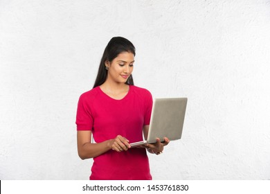 Indian Working Woman Using Laptop, White Background