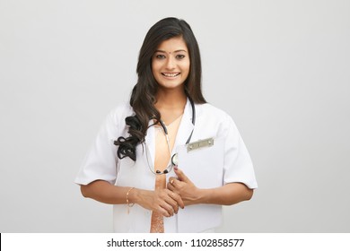 Indian Young Female Doctor Holding Notepad 