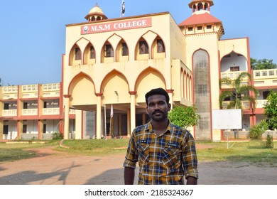 Indian Young Male College Student Standing In Front Of The College And Posing For Photo. Location: Kerala, India, Date 02-02-2022