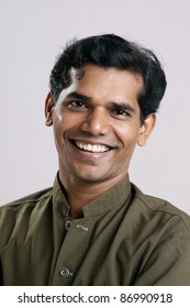 Indian Young Man Posing To The Camera.