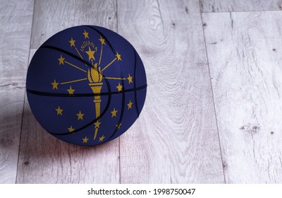 Indiana Flag Is Featured On A Basketball. Basketball Championship Concept.