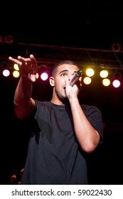 INDIANAPOLIS - AUGUST 13: Hip Hop/ Rap Artist Drake Performs On Stage At The Indiana State Fair On August 13, 2010 In Indianapolis, Indiana