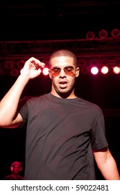 INDIANAPOLIS - AUGUST 13: Hip Hop/ Rap Artist Drake Performs On Stage At The Indiana State Fair On August 13, 2010 In Indianapolis, Indiana