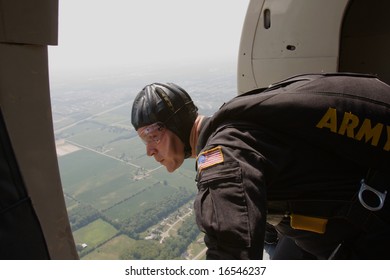 INDIANAPOLIS - AUGUST 23: A Member Of The Golden Knights Parachute Team Look Out Of The Airplane To Survey The Jump Zone At The Indianapolis Air Show On Aug. 23, 2008