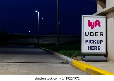 Indianapolis - Circa June 2019: Lyft And Uber Pickup Spot At The Airport. Lyft And Uber Ride Sharing Has Replaced Many Taxi Cabs For Transportation II