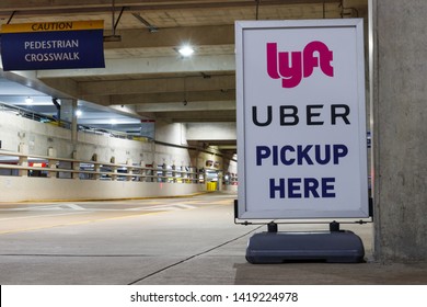 Indianapolis - Circa June 2019: Lyft And Uber Pickup Spot At The Airport. Lyft And Uber Ride Sharing Has Replaced Many Taxi Cabs For Transportation I