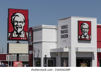 Indianapolis - Circa June 2022: KFC Fried Chicken Restaurant. Kentucky Fried Chicken Is Offering Uber And Door Dash Delivery And Drive Thru Service.