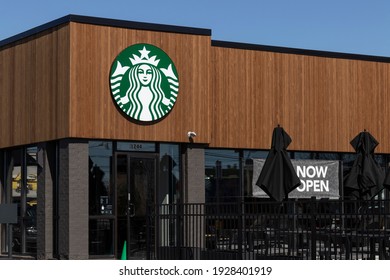 Indianapolis - Circa March 2021: Starbucks Retail Coffee Store. Each Year, Starbucks Celebrates Fall With Pumpkin Spice Lattes.