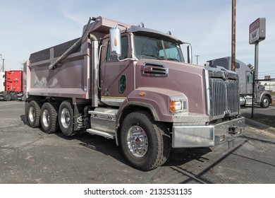 Indianapolis - Circa March 2022: Western Star Heavy Duty 4700SB Dump Truck Display. Western Star Is Owned By Daimler Trucks North America.