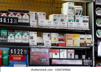 Indianapolis - Circa September 2019: Nicotine Products Display, Including Cigarettes, E-cigarettes And Chewing Tobacco. Juul, Vuse And SEA Are Vape Products Designed To Help Quit Smoking II