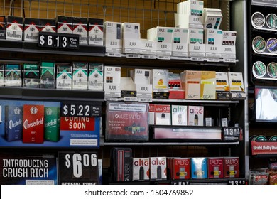 Indianapolis - Circa September 2019: Nicotine Products Display, Including Cigarettes, E-cigarettes And Chewing Tobacco. Juul, Vuse And SEA Are Vape Products Designed To Help Quit Smoking I