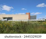 INDIANAPOLIS, IN, USA-SEPTEMBER 08,2014:The Indiana State Museum Building with Colorful Flowers and Beautiful Blue Sky 