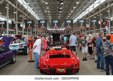 Indianapolis, Indiana May 22, 2021
Auto enthusiast observing Classic cars at Mecum Auto Auction