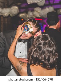 Indianapolis, Indiana / United States: October 21st, 2017. A Couple Enjoys The Irvington Masquerade Ball On The East Side Of Indianapolis.