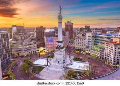 Indianapolis, Indiana, USA downtown cityscape and Monument Circle at dawn.