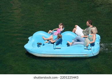 INDIANAPOLIS,INDIANA,USA-SEPTEMBER 2:Unidentified Family Of Four Enjoying Paddle Boat On The Water At Downtown Indy Canal. September 2,2007 In Indianapolis, IN, USA