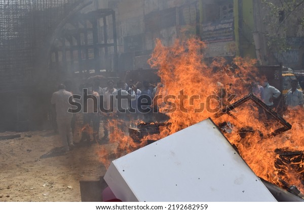 Indians burning Chinese goods and an effigy of\
Chinese President Xi Jinping in protest against the killing of 20\
Indian soldiers by Chinese soldiers in the Galvan area. Gurgaon,\
India. June 17, 2020.