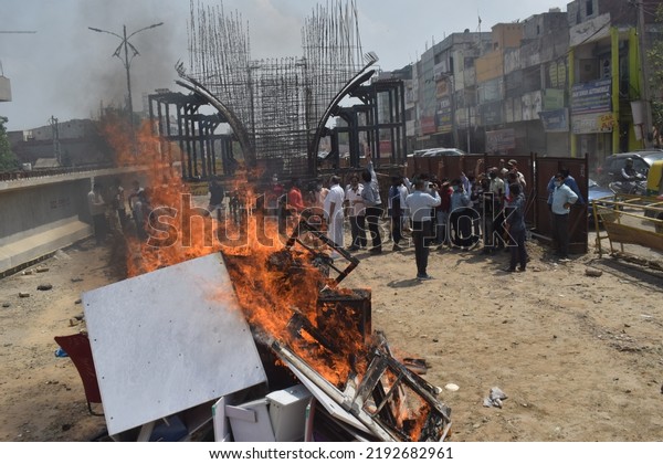 Indians burning Chinese goods and an effigy of\
Chinese President Xi Jinping in protest against the killing of 20\
Indian soldiers by Chinese soldiers in the Galvan area. Gurgaon,\
India. June 17, 2020.
