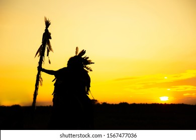 The Indians are riding a horse and spear ready to use In light of the Silhouette