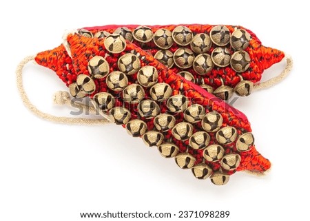 India's traditional Dancing Bells Ghungroo made of brass and crafted in thread isolated on white background. Top view.