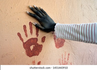 Indigenous Australian Aboriginal Female Hand Print On A Wall. Diversity Concept. No People. Copy Space