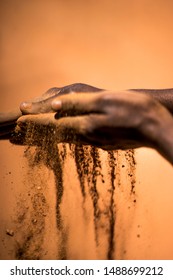 Indigenous Australian Hands Touching Earth 