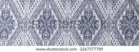Indigo woodcut seamless ethnic geometric pattern. Concept of traditional oriental floral ornament