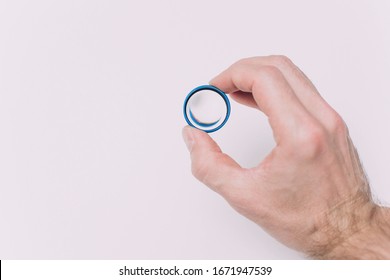 Indirect Ophthalmoscopy In Mans Hand Isolated On White Background