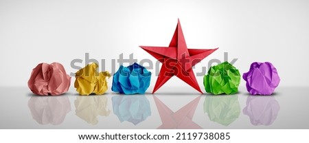 Individual creativity concept and creative innovator or new thinking as a symbol of innovation and inspiration metaphor as crumpled papers with one different paper transforming into an origami star.