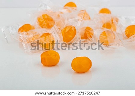 individually wrapped mango pulp candies.