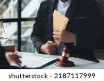 Individuals are giving bribes to officials in order to commit corruption in lawsuits, illegal actions by law enforcement by paying bribes to officials are illegal and unlawful. Fraud concept.