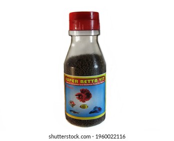 Indonesia, April 6th 2021 - A Bottle Containing Food For Betta Fish With The Super Betta Vit Brand On A White Background