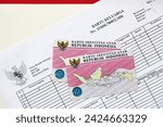 Indonesia child identity card Kartu Identitas Anak or KIA card. ID document for indonesian children close up