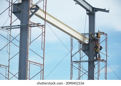 Indonesia, December 11, 2021. Construction Workers Are Installing A Steel Frame With Body Safety Devices In Pohuwato Regency. Gorontalo Province.                               