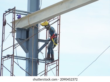 Indonesia, December 11, 2021. Construction Workers Are Installing A Steel Frame With Body Safety Devices In Pohuwato Regency. Gorontalo Province.                               