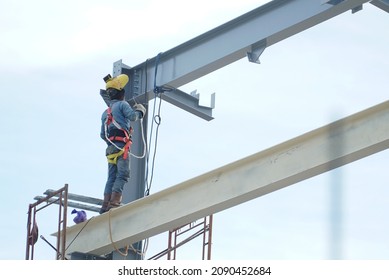 Indonesia, December 11, 2021. Construction Workers Are Installing A Steel Frame With Body Safety Devices In Pohuwato Regency. Gorontalo Province.                               