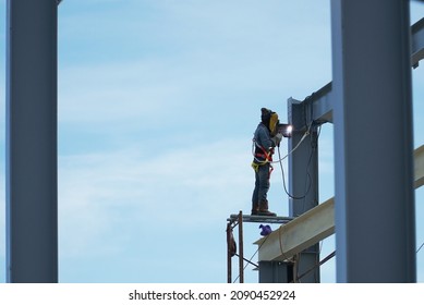 Indonesia, December 11, 2021. Construction Workers Are Installing A Steel Frame With Body Safety Devices In Pohuwato Regency. Gorontalo Province.                               