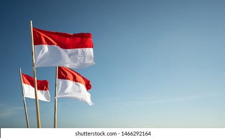 indonesia flags under blue sky independence day concept - Shutterstock ID 1466292164