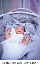 Indonesia, Makassar - October 11, 2022 : Indonesian Baby Girl Sleeping On The Bed