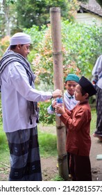 
Indonesia, March 03, 2022, A Religious Leader Praying For His Students