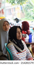 Indonesia, March, 03, 2022, A Woman Attending A Religious Event