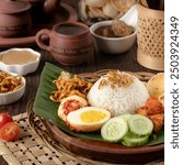 In Indonesia, nasi uduk is usually served for breakfast, the rice is tasty because it is cooked with coconut milk and other complementary spices, the side dishes themselves are adjusted. 